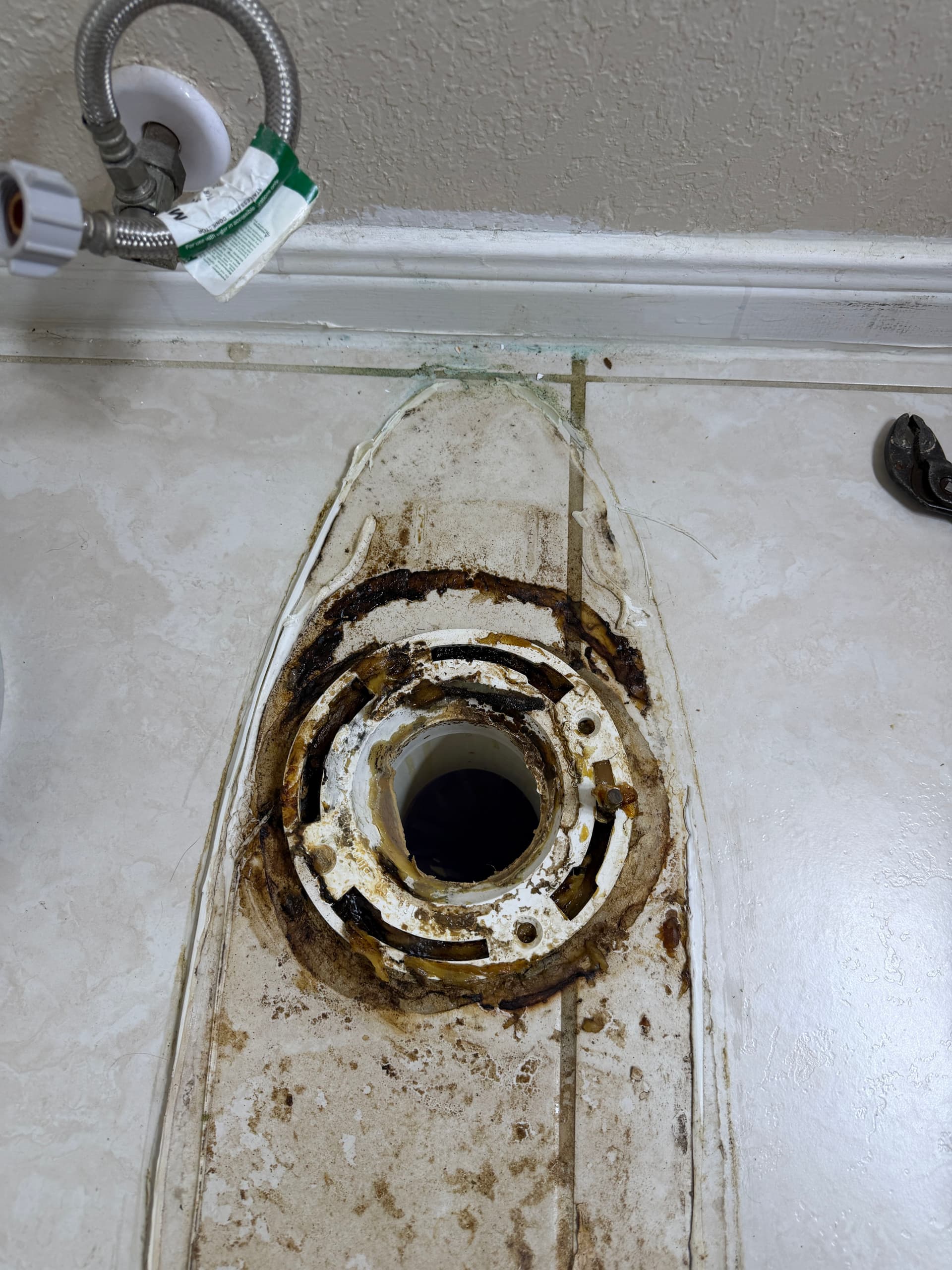 Backed-Up Toilet With a Broken Floor Flange Fixed Right image