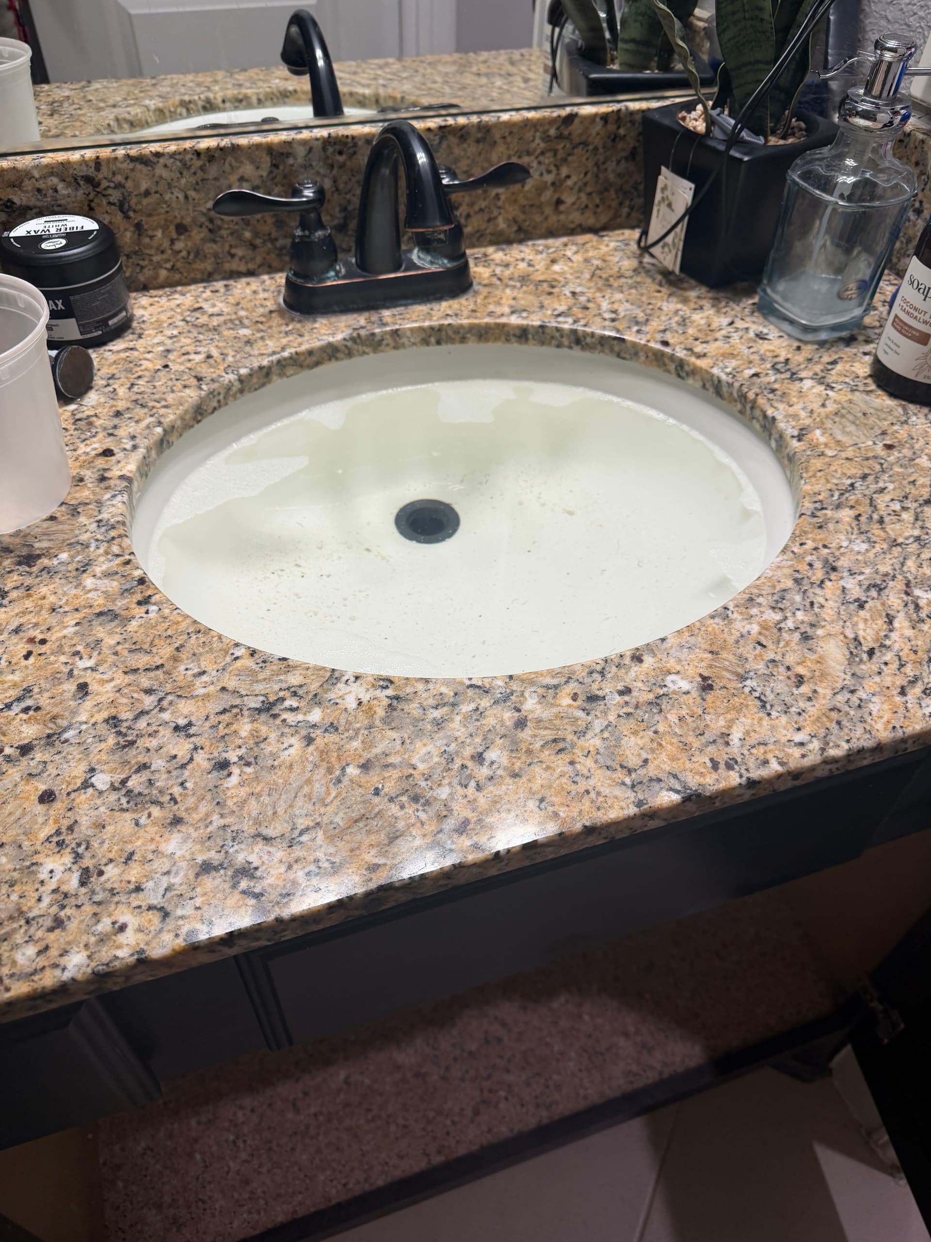 Overflowing Bathroom Sink Fixed After A/C Drain Blockage image
